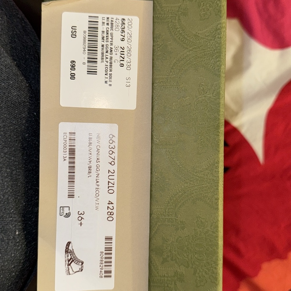 Gucci
Tennis 1977 GG Canvas High-Top Sneaker - Picture 8 of 8